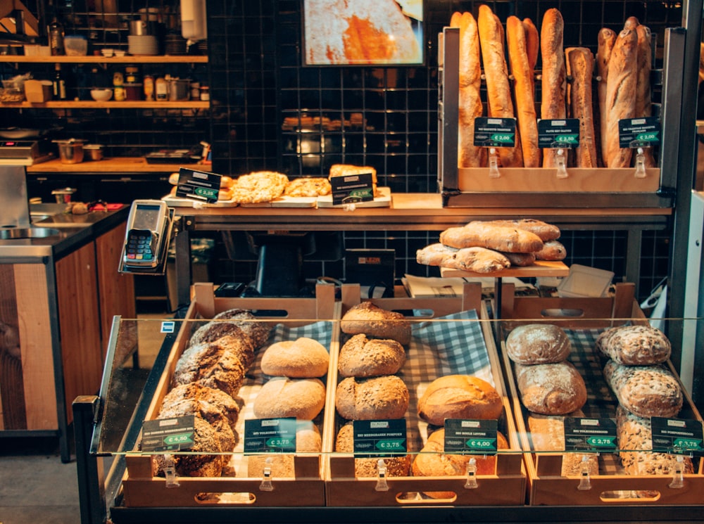 Warm interior of THE BAKERY BANÚS with fresh bread on display
